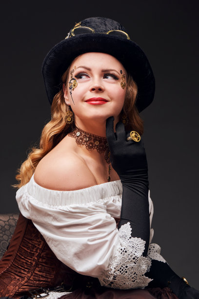 蒸汽朋克风格的年轻美女坐在椅子上图片下载