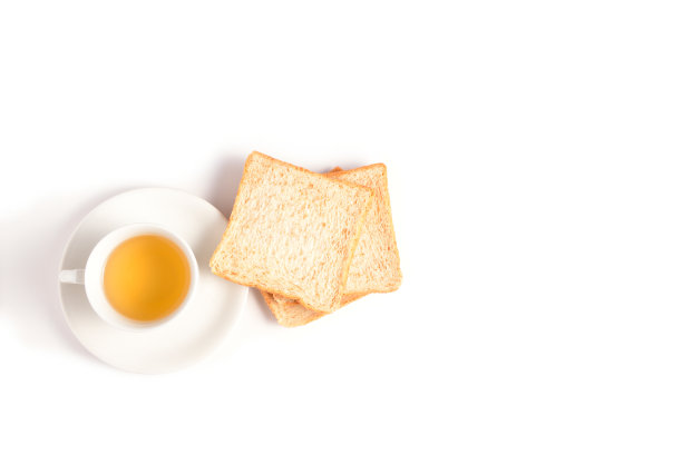 一杯百乐汁和切片面包。图片下载