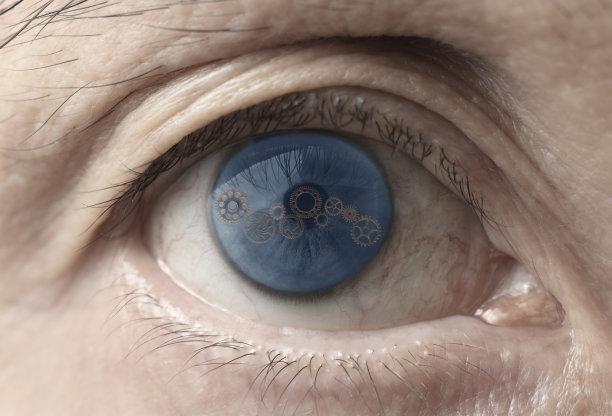 男人的蓝眼睛与齿轮图片下载