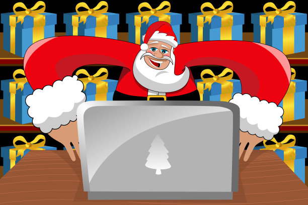 现代圣诞老人在办公桌上用电脑工作图片下载