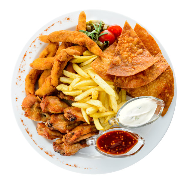 配以不同的点心和酱料在一个白色盘子孤立的o图片下载