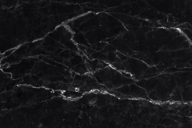 黑白背景的大理石墙面纹理为设计艺术作品，瓷砖石的无缝花纹具有明亮和豪华。图片下载