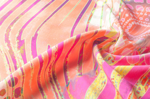 纹理背景图像，丝织品与抽象图案。彩色丝绸织物特写。滤镜调图像在instagram风格。丝绸面料的照片。纺织品设计。绘画面料，蜡染绢画图片下载