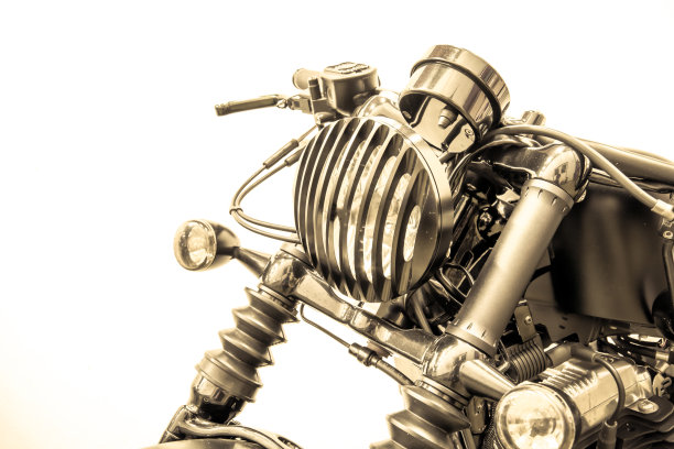 复古的摩托车细节在路上，复古的基调图片下载
