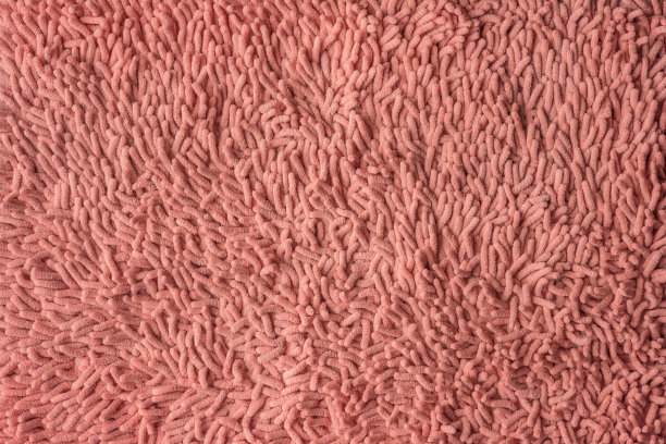 地毯的背景是粉红色的超细纤维，质地优美。图片下载