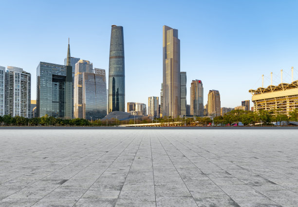 空荡荡的方形地砖和广州的现代建筑图片下载