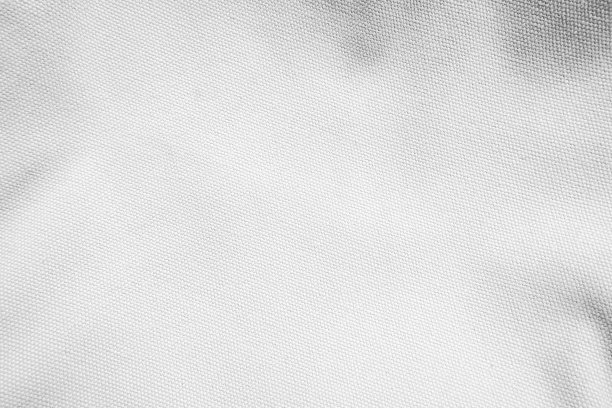 白色棉布编织帆布纹理与灰色图案背景。图片下载