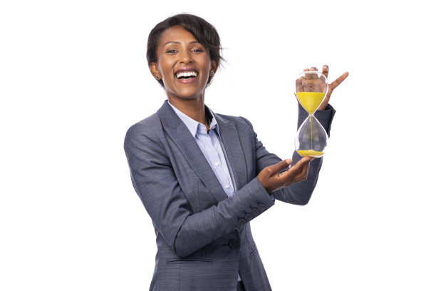 有沙漏的女商人。图片下载