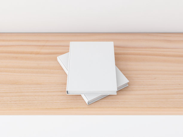 木制书架上有两本白色的书，有纹理的封面图片下载