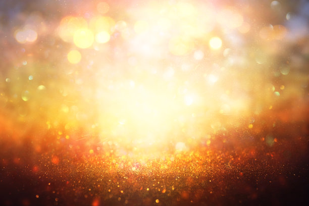 闪烁的复古灯光背景。白银和黄金。de-focused。图片下载