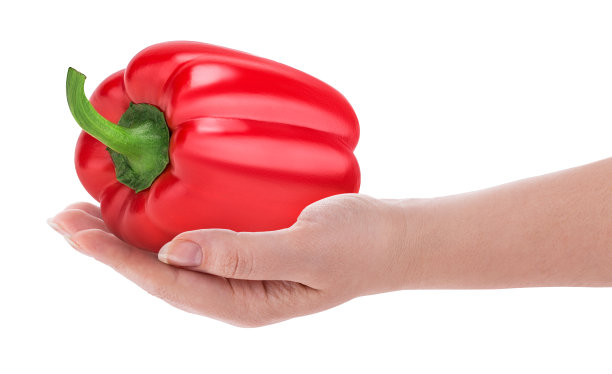 手里拿着红甜椒图片下载