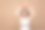 美丽的黑发女人在白色的裙子拿着红色的礼品盒在头顶和看着镜头微笑。情感和感觉的概念。图片下载