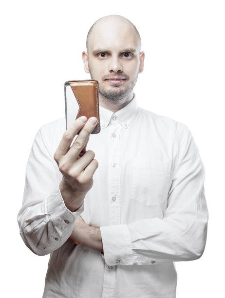 穿白衬衫带钱包的帅哥。图片下载