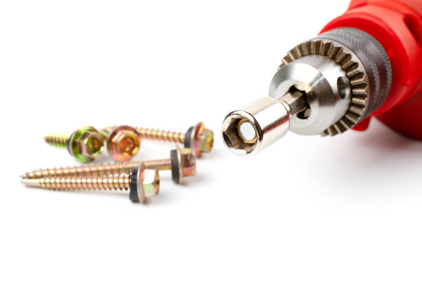 红色电钻与HEX驱动器磁性钻头套筒驱动器。图片下载