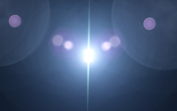 蓝色数字镜头光晕与明亮的黑色背景用于纹理和材料图片下载