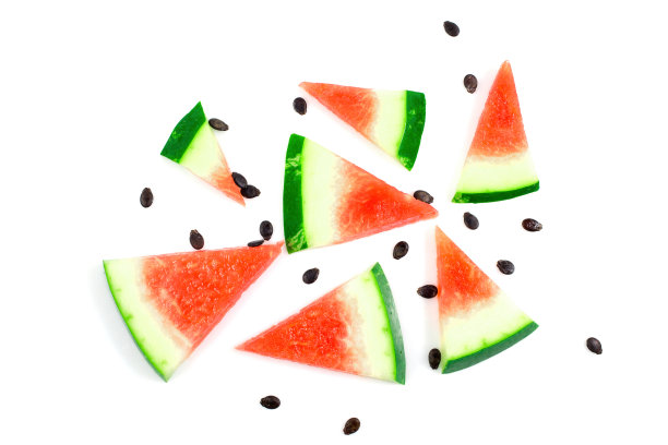 西瓜的模式。白底黑子的西瓜切片。平躺，俯视图。图片下载