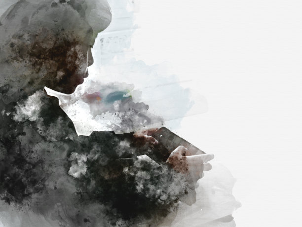 摘要小男孩正在手机上玩一款以水彩插画为背景的游戏。模糊移动电话图片下载