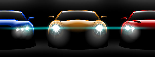 现实的红黄蓝三跑车视图与解锁的前灯在黑暗中图片下载