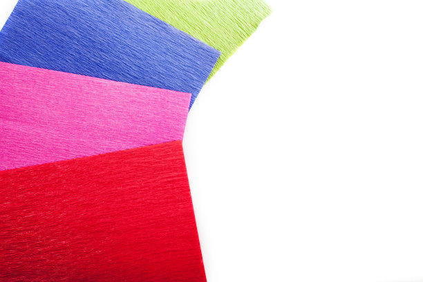 绉纸。红色，粉色，绿色和蓝色的工艺板。图片下载