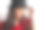 一个在工作室里戴着黑帽子的年轻漂亮女人的特写。图片下载