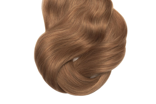 棕色毛发孤立在白色背景上。长马尾辫交织在一起图片下载