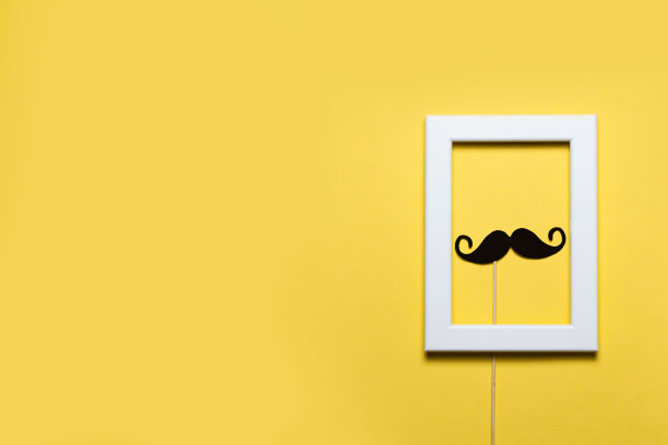 在黄色背景里有胡子的框架。图片下载