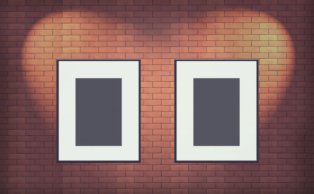 挂在砖墙上的空相框图片下载