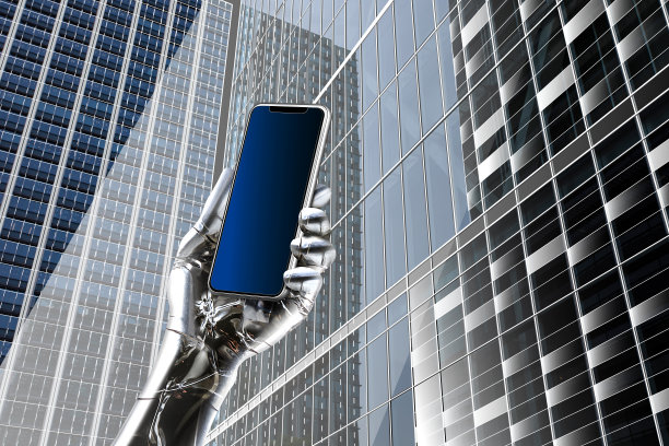 一个拿着电话的机器人的手在一个办公城镇图片下载