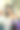 年轻的黑发长发女子用吹风机吹风图片下载