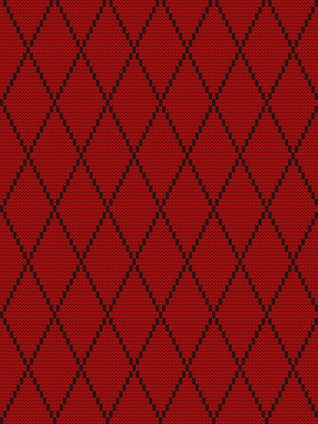 无缝针织图案与黑色菱形在一个红色的背景图片下载