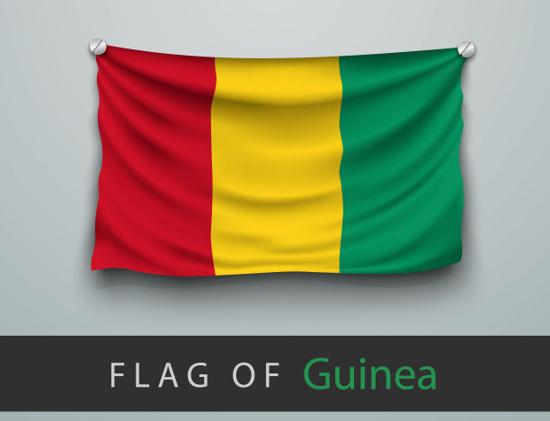 几内亚国旗被打烂，挂在墙上，螺丝被拧上图片下载