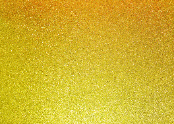 抽象闪烁的圣诞背景与金色的灯光闪烁纹理图片下载