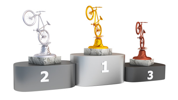 山地车金牌，银牌和铜牌，大理石底座的领奖台图片下载