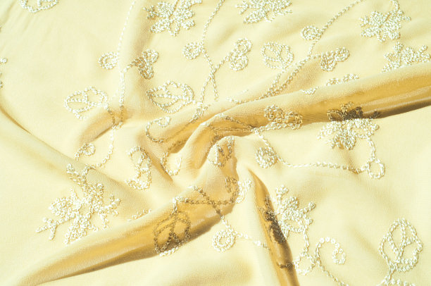 质地、背景、模式。女性的披肩的颜色。秋麒麟草属植物。l图片下载