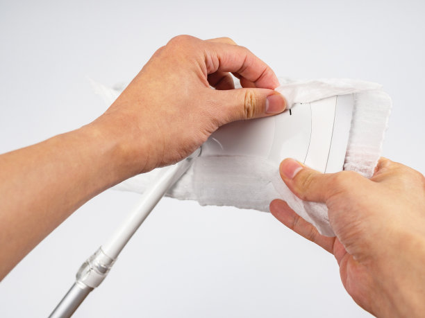 穿着纸在平板拖把近距离图片下载