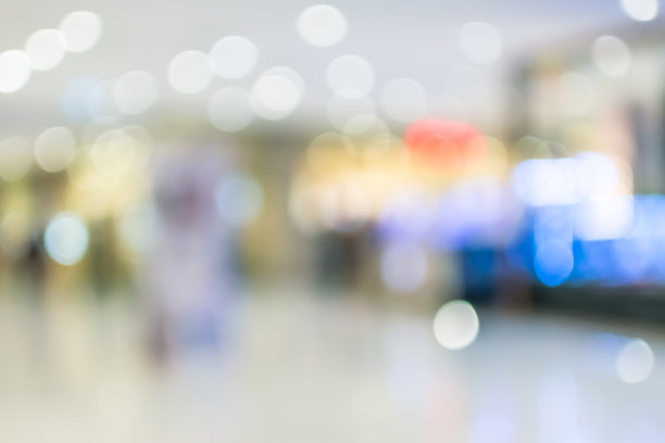 模糊的购物中心背景内大堂走廊与零售商店和柜台销售商品产品图片下载