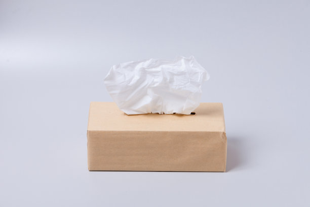 纸巾盒孤立在灰色背景图片下载