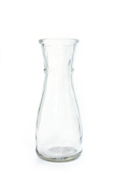 白色背景上的玻璃瓶。图片下载