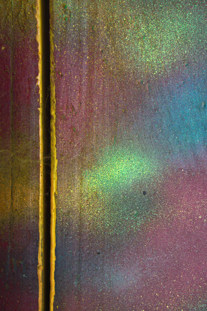 五颜六色的垃圾纹理和破旧的油漆。色彩丰富的复古，复古背景与不同层次的油漆。用于设计的库存照片。图片下载