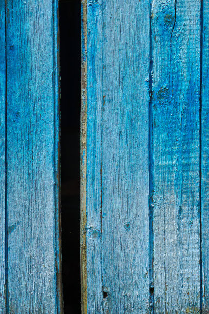 废弃住宅中剥落的油漆纹理色彩丰富的复古，复古背景与不同层次的油漆。用于设计的库存照片。图片下载