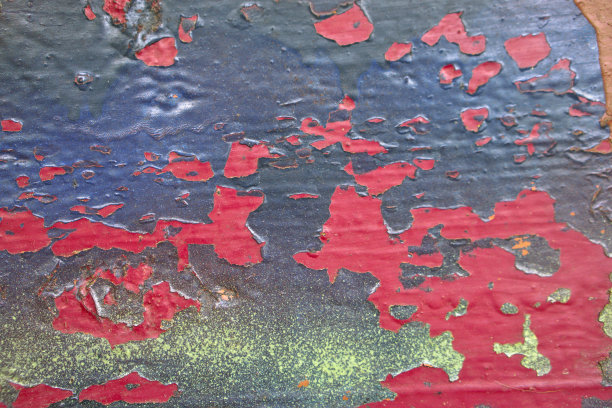 五颜六色的垃圾纹理和破旧的油漆。色彩丰富的复古，复古背景与不同层次的油漆。用于设计的库存照片。图片下载