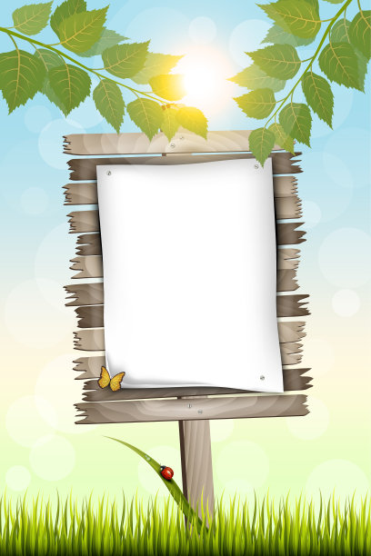 草地上立着一张白纸的木制广告牌。图片下载