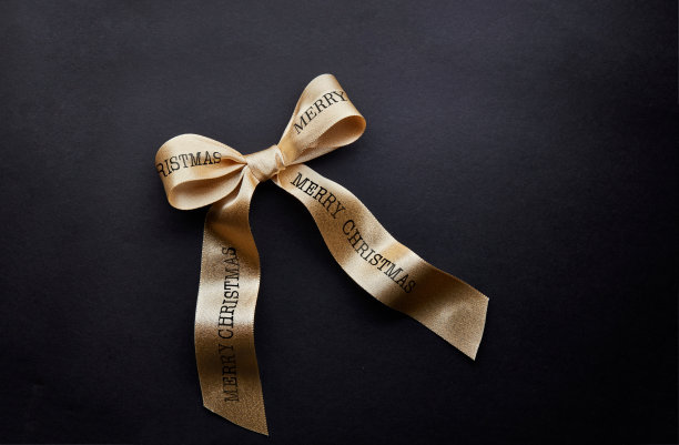 金色的圣诞丝带蝴蝶结图片下载