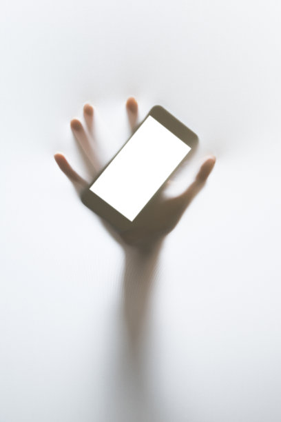 手的剪影与手机图片下载