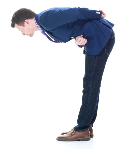 商人鞠躬的侧视图图片下载