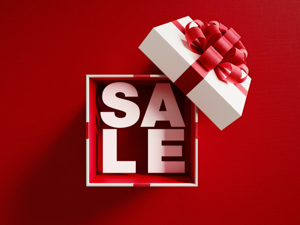 红色丝带系在白色礼盒上的促销文字图片下载