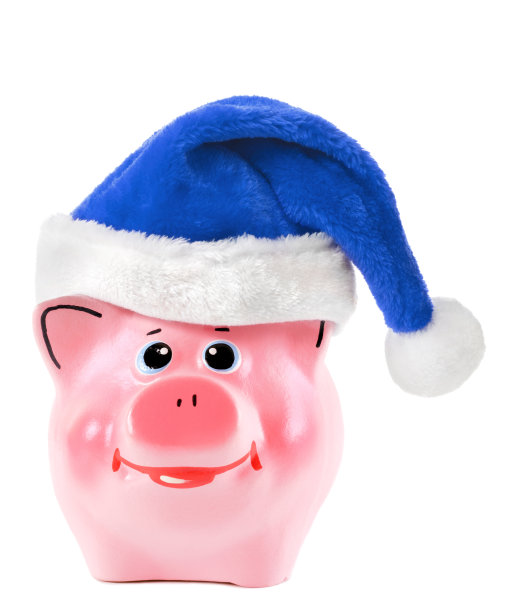 带着蓝色圣诞帽的储蓄罐(被白色隔离)图片下载