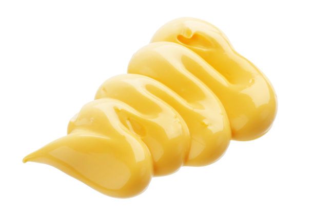 一小把蛋黄酱放在白色的背景上图片下载