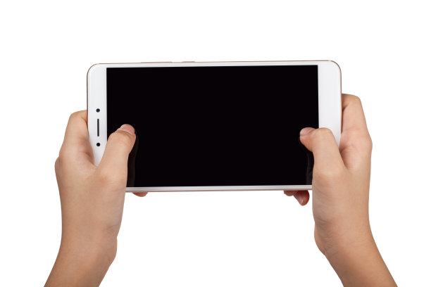 孩子双手拿着智能手机图片下载