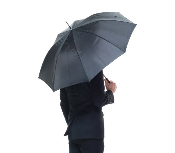 英俊的商人拿着一把伞图片下载